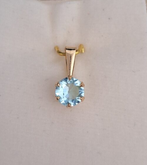 Kultainen riipus vaaleansininen kivi 10012