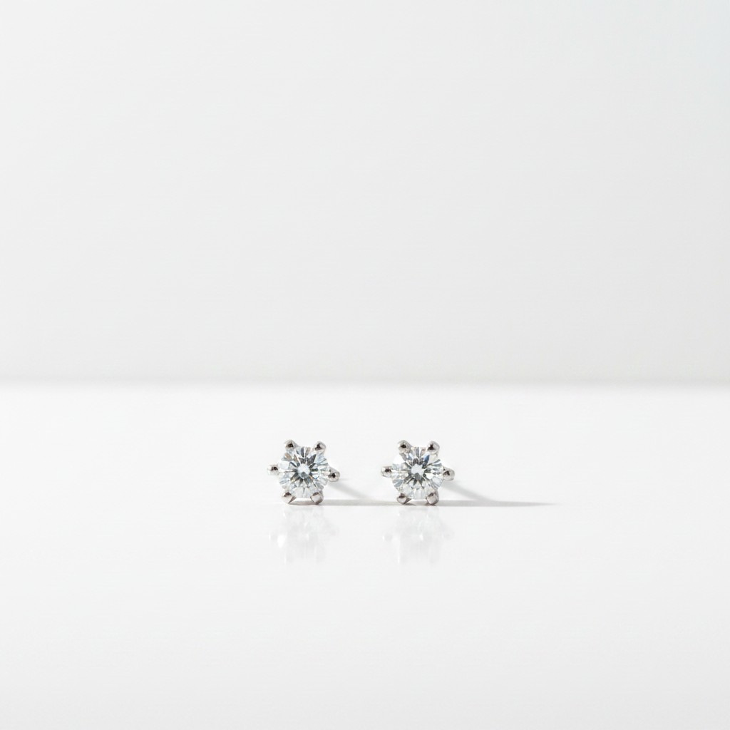 Valkokultaiset timanttikorvakorut 2x0,07ct